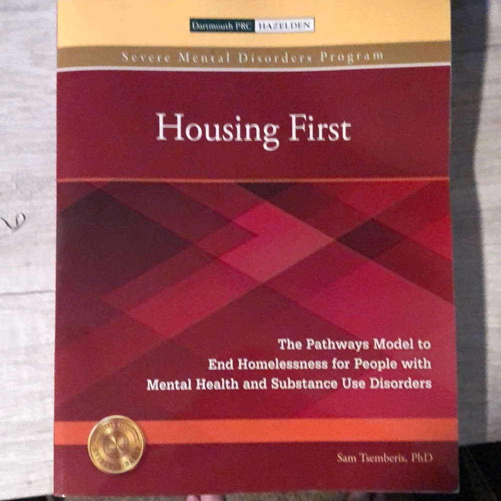 Housing First, by Sam Tsemberis, PhD 244 Pages.  Book.  As shown.